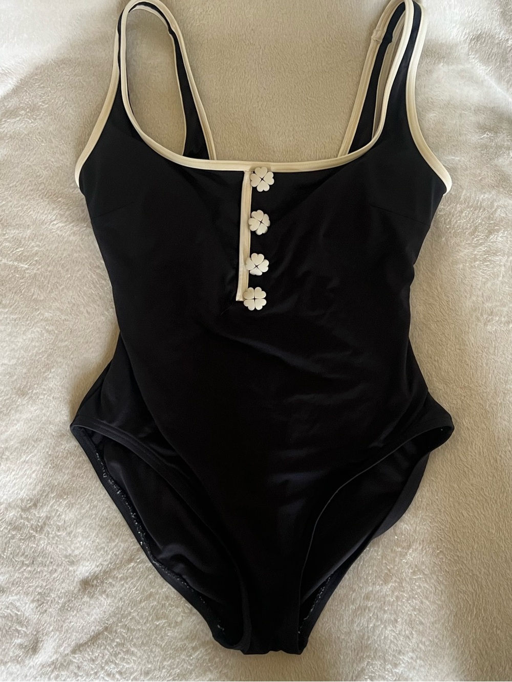 Kate spade feminine Black & cream one piece with flower buttons